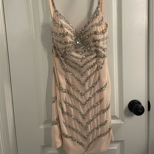 Short fancy light pink dress with silver sequin details